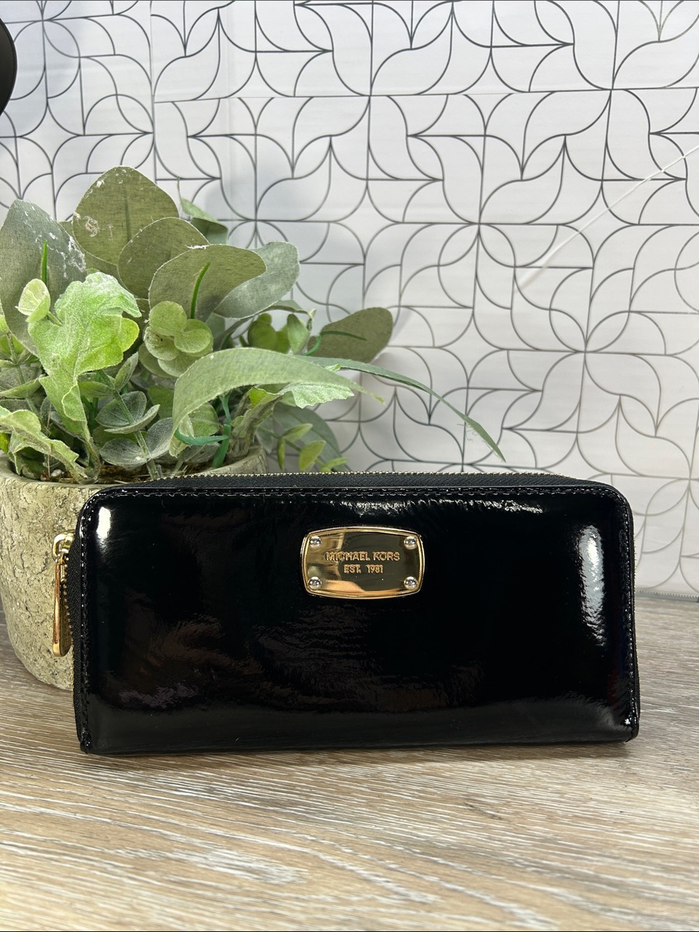 2828 Michael Kors Black Patent Leather Zip Wallet with Gold Plaque